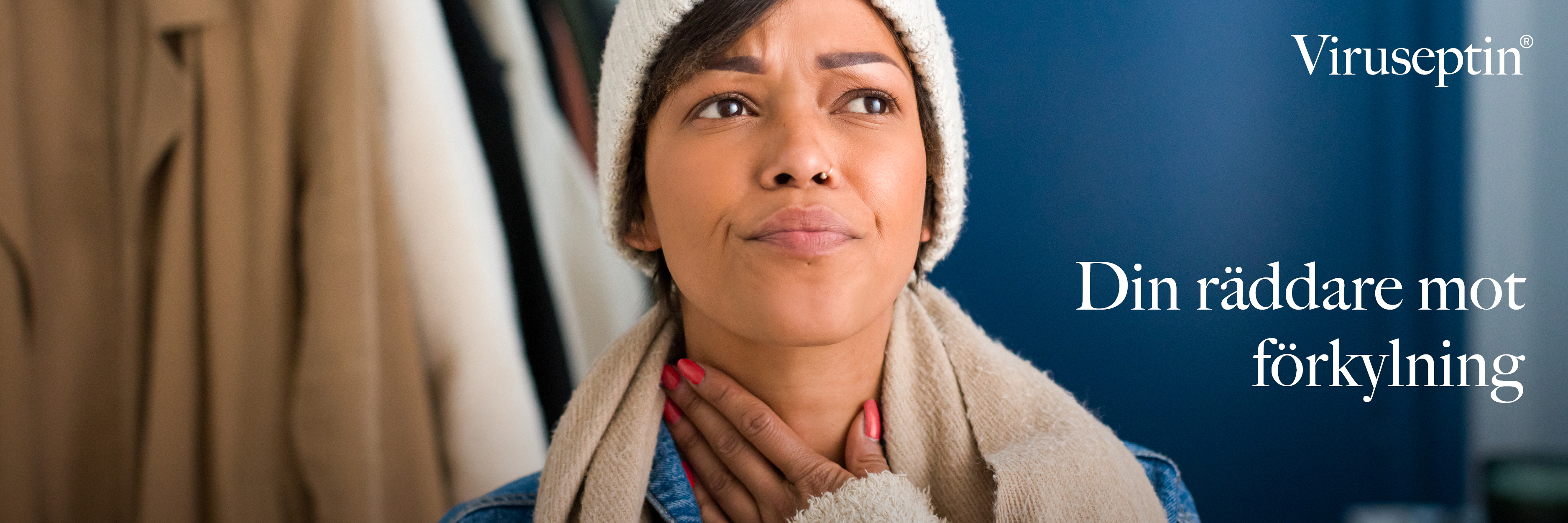 Kvinna som ser besvärad ut och tar sig för halsen med texten "Viruseptin - Din räddare mot förkylning".