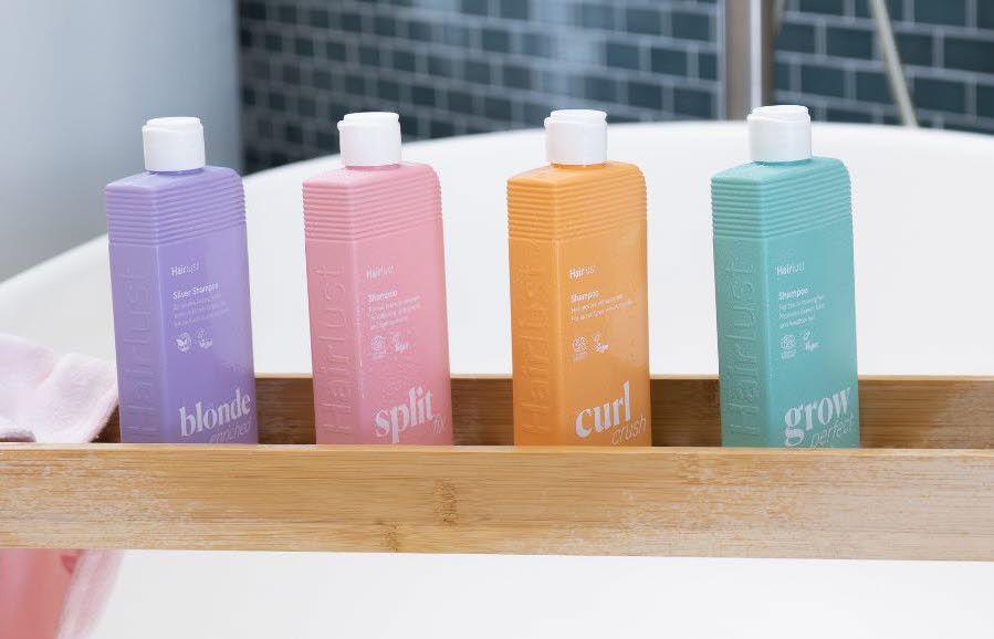 Flera olika Hairlust produkter på rad.